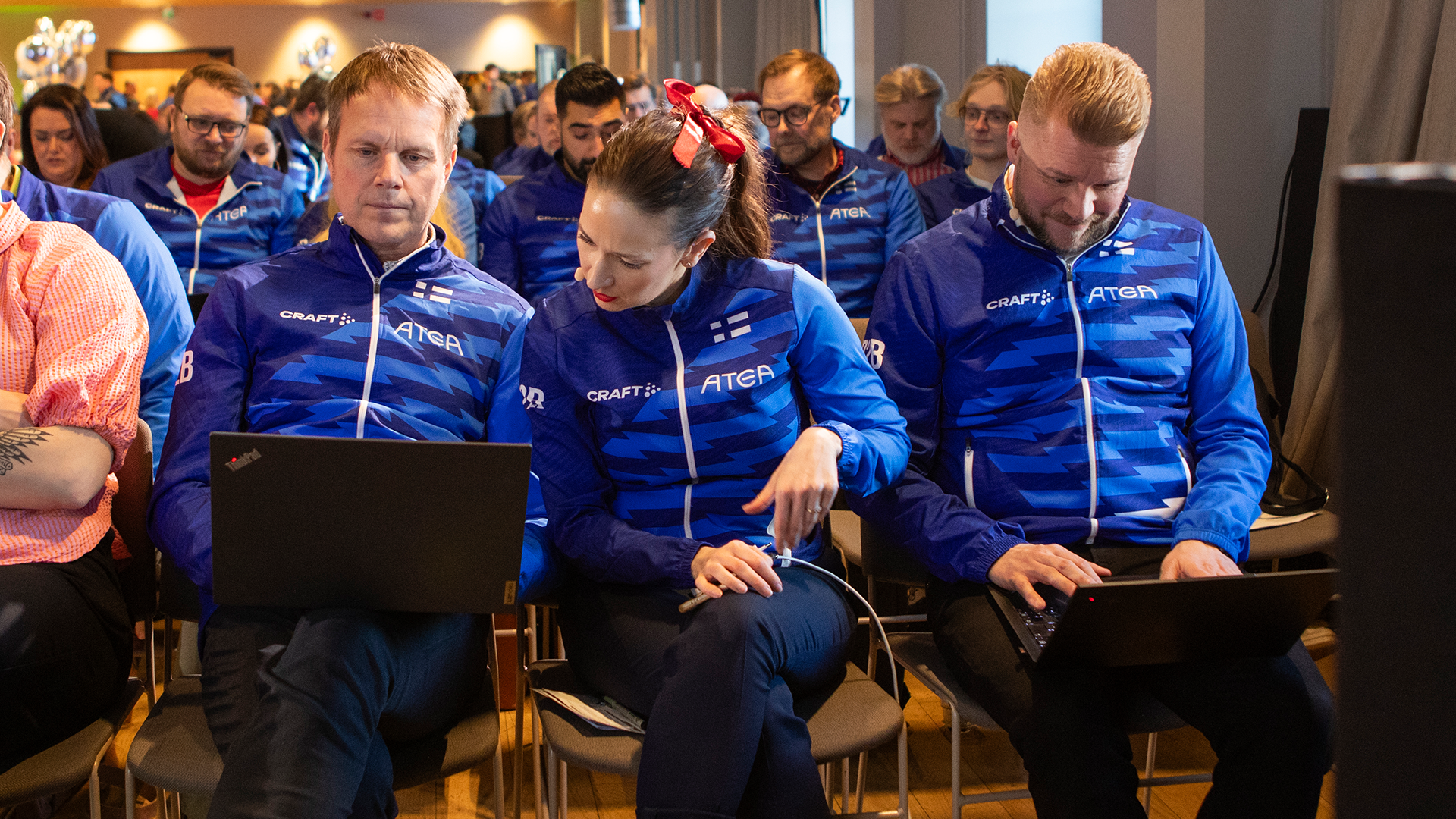 People watching laptop screens